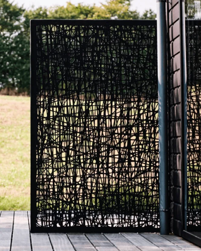 A BAS Panel in the Rush pattern used as a fence on a deck.